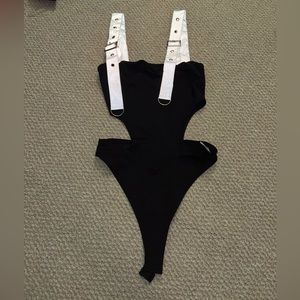 Reflective strap bodysuit - shown with and without flash